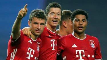 Atacatorii lui Bayern Munchen Thomas Muller, Robert Lewandowski și Serge Gnabry