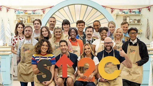   Знаменитостите от The Great Celebrity Bake Off за Stand Up To Cancer в група в палатката.