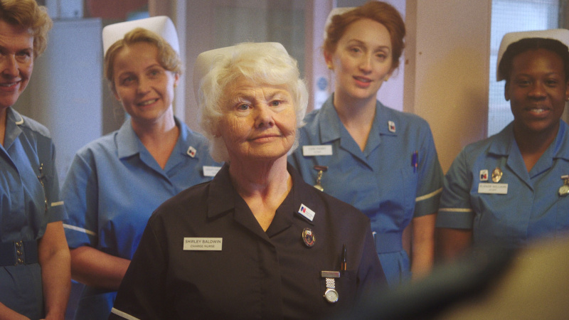  Annette Badland ca Shirley în flashback-uri.