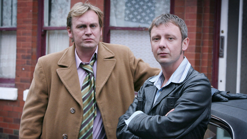  Life on Mars'ta Gene Hunt ve Sam Tyler rolünde Philip Glenister ve John Simm