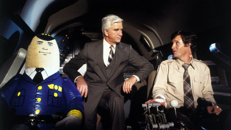   Leslie Nielsen a Robert Hayes v lietadle