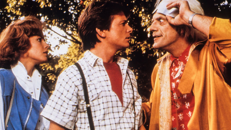  Elisabeth Shue, Michael J Fox und Christopher Lloyd in „Zurück in die Zukunft Teil II“.