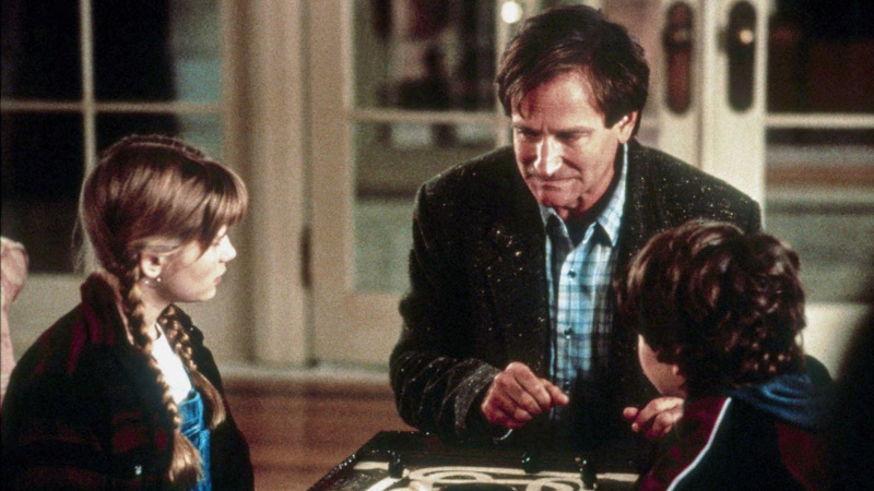   Kirsten Dunst, Robin Williams a Bradley Pierce v Jumanji