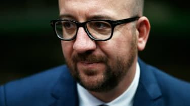 Belgijski premier je odstopil zaradi spora zaradi pakta ZN o imigraciji