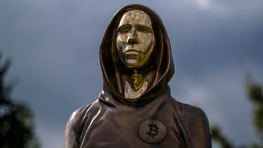 A gold statue of Satoshi Nakamoto