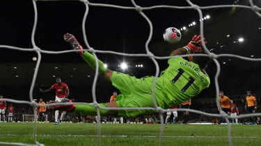 Vratar Wolves Rui Patricio je v remiju proti Manchester Unitedu ubranil enajstmetrovko Paulu Pogbi.