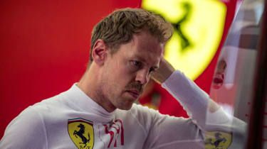 Voznik Ferrarija Sebastian Vettel je z Red Bullom osvojil štiri naslove v formuli 1