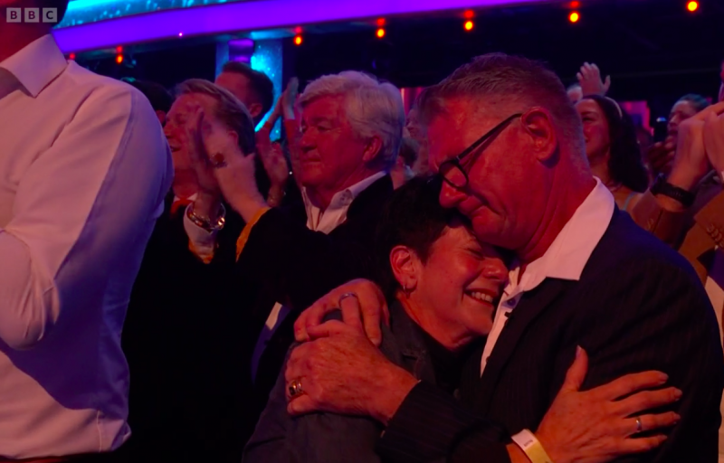   Diana's parents cry in the audience