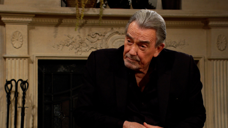   Eric Braeden ako Victor v celom čiernom vo filme The Young and the Restless