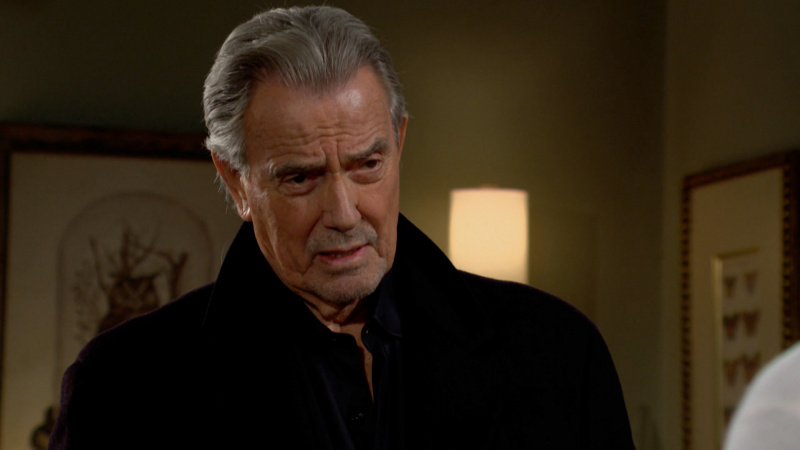   Eric Braeden în rolul lui Victor Newman într-o haină neagră în The Young and the Restless