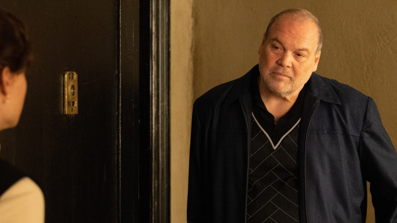   Vincent D'Onofrio as Vincent Gigante standing outside of an apartment in Godfather of Harlem season 3