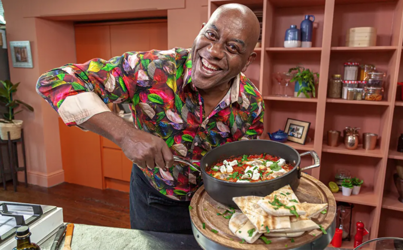   Ainsley's Food Flavours promo image featuring Ainsley stirring a bowl